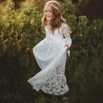 Elegant white lace flower girl dress for girls with long sleeves and boutique princess styling